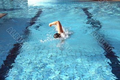 a man learn swim the crawl in pool
