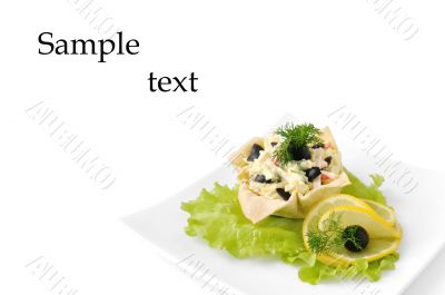 Salad with crab meat in a basket Salad with crab meat in a basket