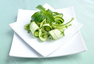 Cucumber salad with greens and sesame