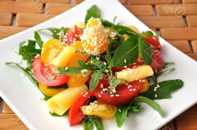 salad of red and yellow tomatoes