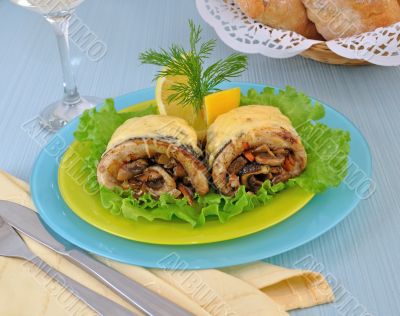 Herring stuffed and baked with mushrooms and cheese Herring stuffed and baked with mushrooms and cheese