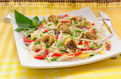 Scrambled eggs with green onions, fresh vegetables and sesame  seeds