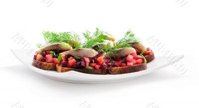 Sandwiches with rye bread, herring and vegetables