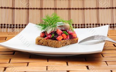 Sandwiches with rye bread, herring and vegetables Sandwiches with rye bread, herring and vegetables