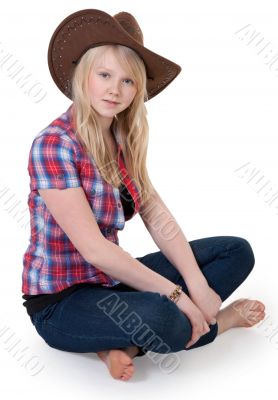Beautiful girl in a cowboy hat