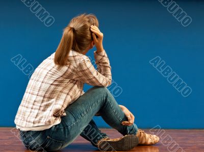 Offended by a girl sitting on the floor