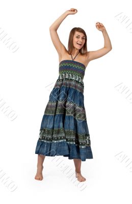 beautiful girl in jeans sarafan dancing