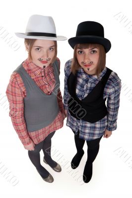 Two girls with painted mustaches