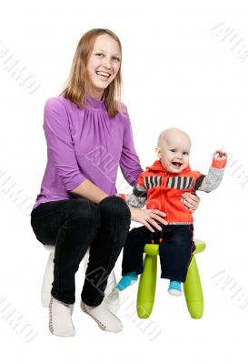 Mother and son in a chair in the studio