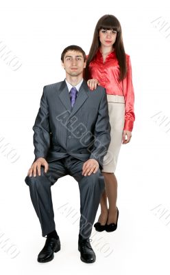 married couple in business attire in the studio