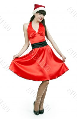 girl in a red dress and hat santa