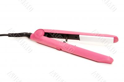 Electric pink hair straightener