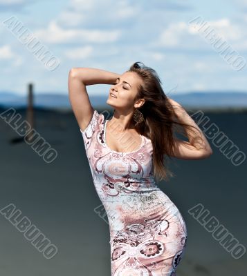 beautiful girl in a stylish dress