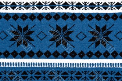 knitted blue background with a pattern
