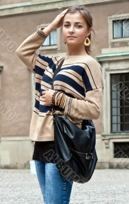 girl in beige sweater