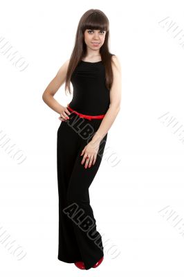 girl in black pants and red shoes in the studio