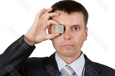 Businessman closes one eye, a processor