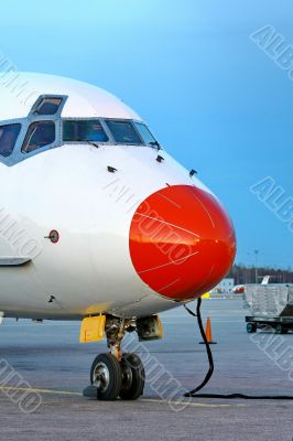 Closeup of red aircraft nose Closeup of red aircraft nose