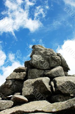 Huge rocks against blue sky