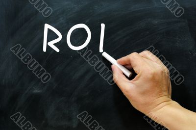 ROI written on a Blackboard / chalkboard