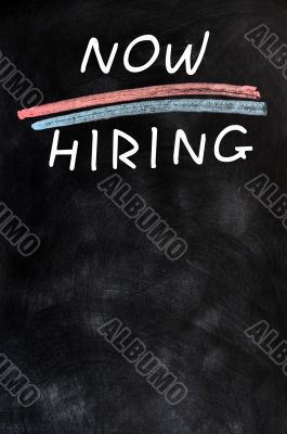 Now hiring - blank advertising on a blackboard 