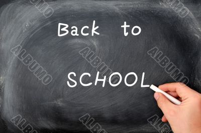 Back to school written on a blackboard