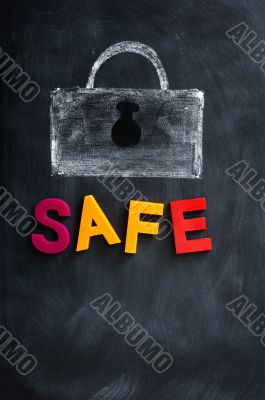A Lock drawn in chalk with the word Safe