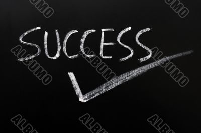 Word of success with a tick