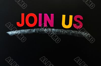 Join us - text on a blackboard