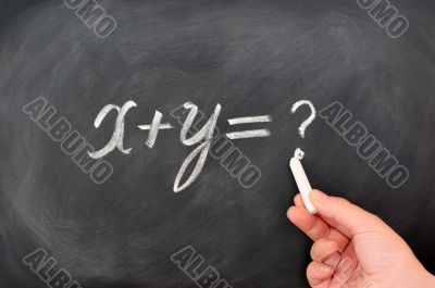 Question formula written on blackboard