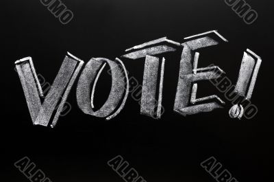 Vote word written on a blackboard