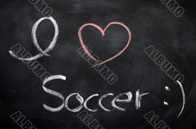 I love soccer - text written on a blackboard