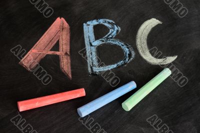 ABC written in colorful chalk