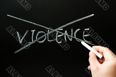 Crossing out violence on a blackboard