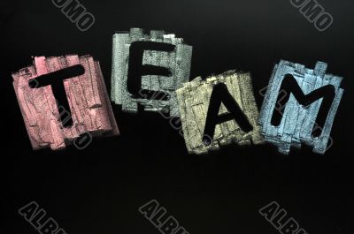 Team written in colorful chalk