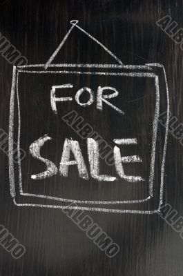 For sale - text written on blackboard