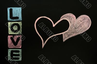 Love drawn in chalk on a chalkboard 