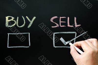 Buy or sell check boxes on blackboard Buy or sell check boxes on blackboard