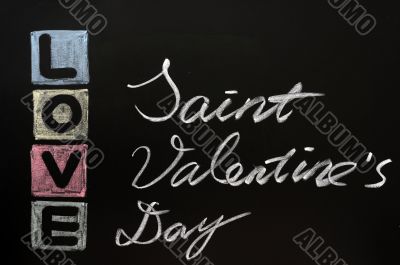 Love drawn in chalk on a chalkboard 