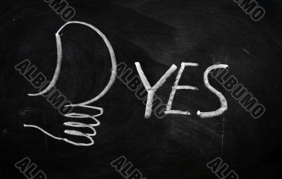 YES written on blackboard