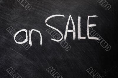 On sale written on blackboard On sale written on blackboard