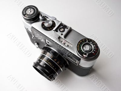 Vintage photo camera on white background