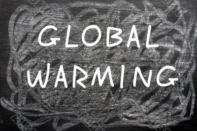 `Global Warming` written on a chalkboard 