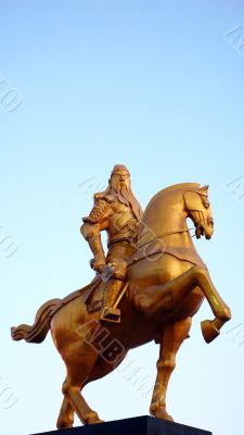 Ancient sculpture of Guangong on the horseback