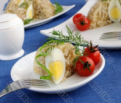 A piece of jellied chicken and egg A piece of jellied chicken and egg