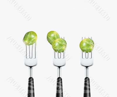 Tomato pierced by fork,  isolated on white background 