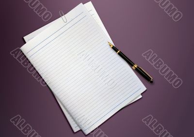 a pen and blank paper on the table a pen and blank paper on the table