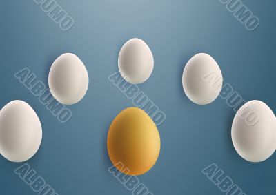 unique golden egg between white eggs