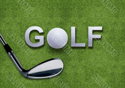 Golf ball and putter on green grass 