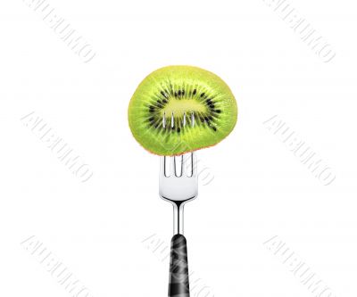 kiwi slice pierced by fork,  isolated on white background 